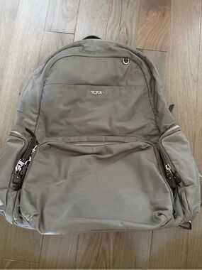 tumi alpha bravo knox backpack reflective silver Leather Portmantos A padded laptop compartment fits devices up to 15 inches TUMI Alpha Bravo Nomadic Backpack
